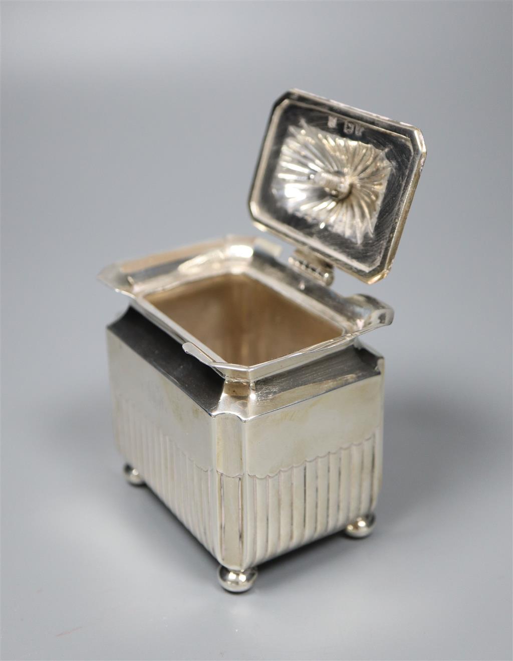 A late Victorian demi fluted silver rectangular tea caddy, Goldsmiths & Silversmiths, London, 1894, height 9cm,